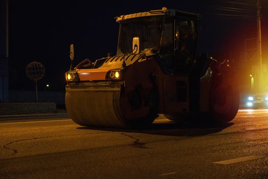 repairing the road in the night city