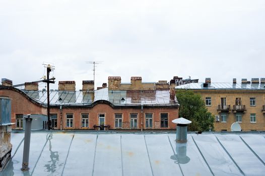 wet roofs of the city in a large metropolis rainy autumn