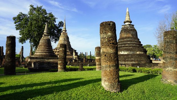 Historical Park Wat Mahathat temple pagoda landscape in Sukhothai world heritage
