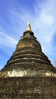 Historical Park Wat Mahathat temple pagoda closeup in Sukhothai world heritage