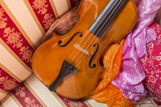 Cremonese violin in a still life composition