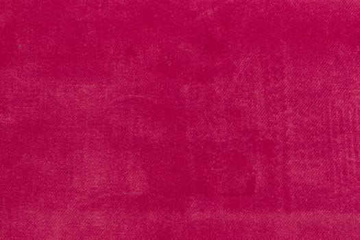 The Velvet fabric texture in fuchsia color.