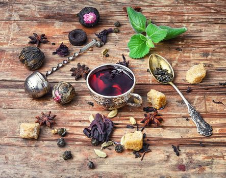 Cup of tea,dry tea leaves of different varieties and spices