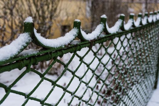 Winter snow fencing, building security, winter texture