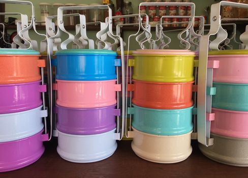 Take away food containers. Colorful  metal tiffin.