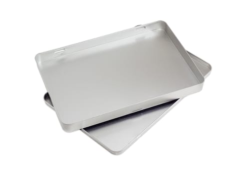 Open flat empty rectangular tin box with removed lid on a light background
