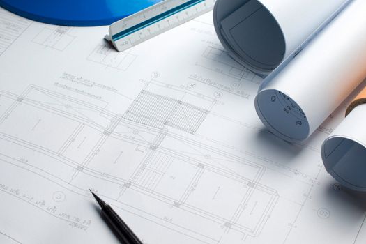 architectural plans project drawing with blueprints rolls