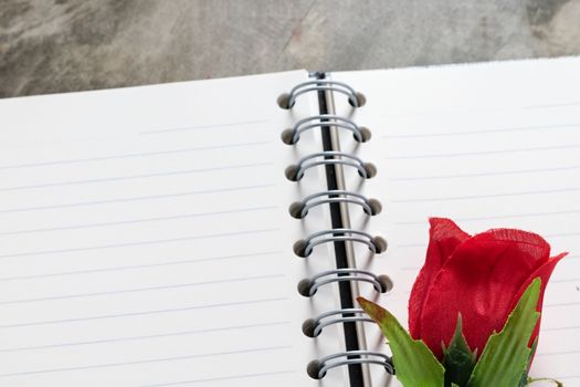 Valentines day background. Valentine hearts with open blank notebook on dark wooden background. Writing romantic letters