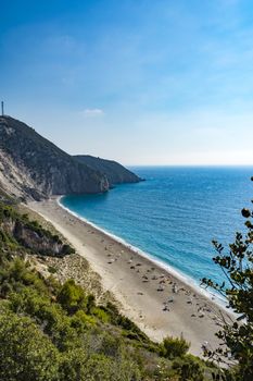 Lefkada island, Mylos beach, Greece - August 30 2016: The sand is pure white and the waters are turquoise. The beach is at the end of the scenic footpath setting out from Aghios Nikitas.