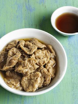 close up of a bowl of seitan vegetarian mock abalone