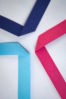 abstract background composition of colored paper ribbons