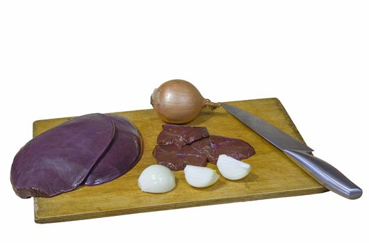 fresh veal liver with onions on a wooden cutting board isolate