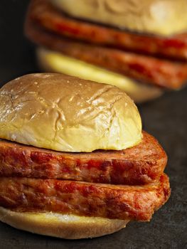 close up of rustic spiced ham luncheon meat sandwich