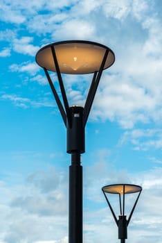 modern style lamp against blue sky