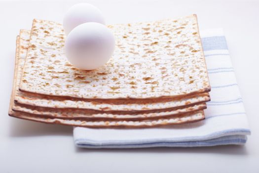 Jewish celebration passover with matza and egg