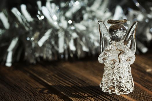 Crystal Angel.Crystal angel with star in the hands. New Year decoration. Christmas ornaments, christmas decoration