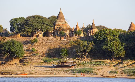 Boats and pagoda in Bagan , Myanmar