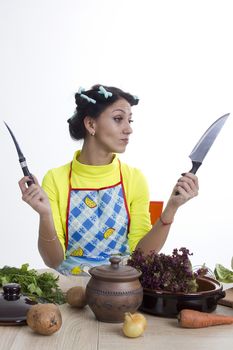 Housewife is preparing in the kitchen on a white background