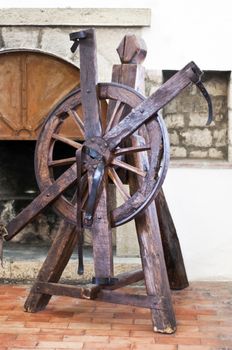 wheel of torture in an old castle used to the times of the Inquisition