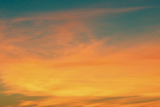 a unique pattern of sunset on a blue sky