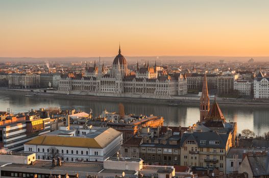 Illuminated Hungarian Parliament Building in Budapest, Hungary at Sunrise