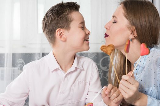 Happy Valentines Day, Mother day or Woman 8 march Day. Young boy spend time with his mum and celebrate it