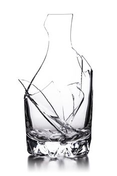 broken empty glass isolated on white background