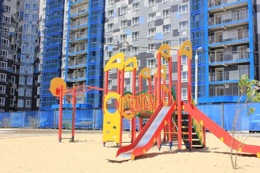 New children's playground in the yard of a house