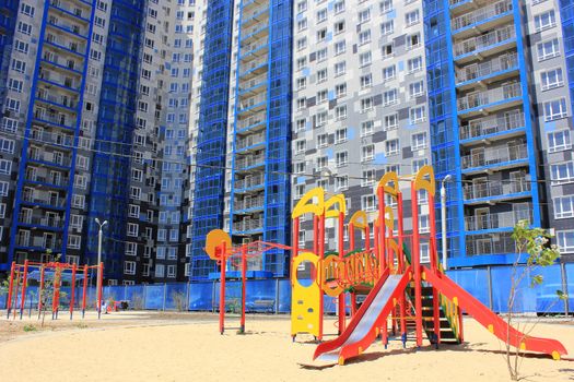 New children's playground in the yard of a house