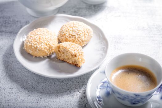 Almond cookies and coffee served on a