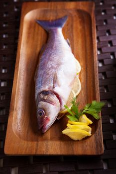 Sea bass with parsley and lemon, ready for cooking
