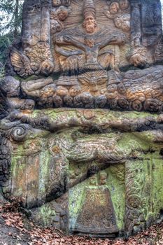 Stone altar carved in sandstone cliff in the forest near the village Marenicky, Lusatian Mountains, Czech Republic.
