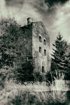 Image of the abandoned haunted house in grunge style