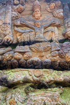 Stone altar carved in sandstone cliff in the forest near the village Marenicky, Lusatian Mountains, Czech Republic.
