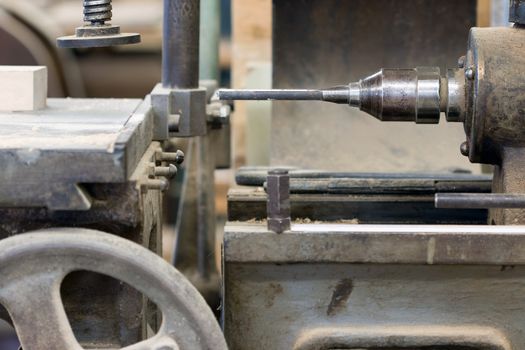 Detail of the hole cuttern in the carpentry workshop