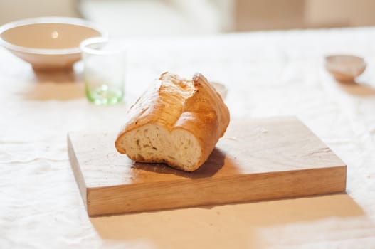 close-up of a piece of dry bread on a cutting board