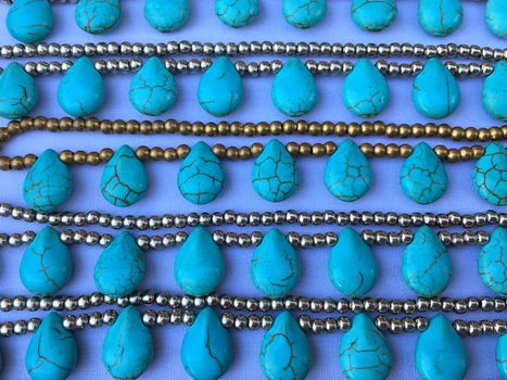 Closeup jewelry background, bracelets with turquoise.