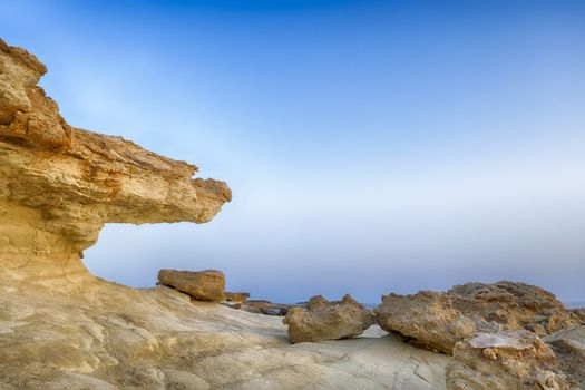 by erosion affected rocks by the sea on the coast of Cyprus