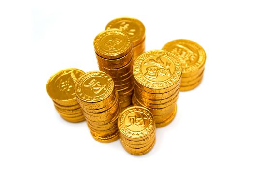A pile of golden coins isolated on white background