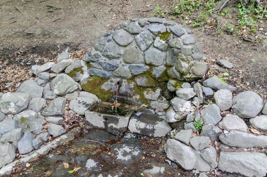 Fountain with fresh cold water in mountain Vitosha, Sofia