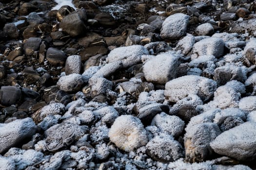 Frozen rocks with frost over them