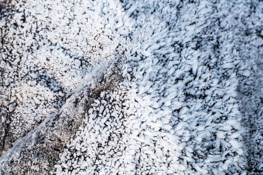 Frozen rocks with frost over them