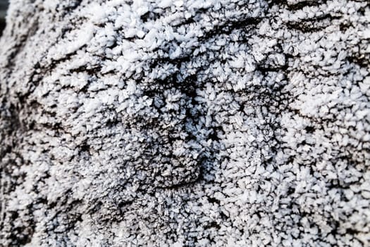 Frozen rocks with frost over them