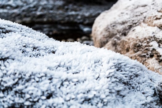 Frozen rocks with frost over them