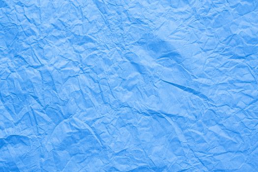 Blue wrinkled paper background texture