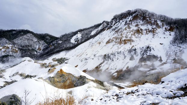 Noboribetsu onsen snow winter landscape hell valley national park in Jigokudani, Hokkaido, Japan