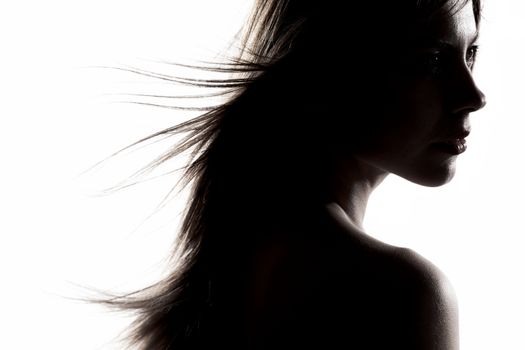 silhouette portrait of a beautiful caucasian girl