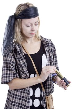 Young woman in the image of a pirate on a white background