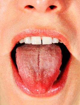 opened mouth of woman with put her tongue out