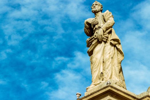 Detail of a statue in a Sicilian baroque. St. Peter